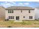 Exterior view of home, featuring a sliding glass door, and many windows at 1607 Willowcrest Rd, Durham, NC 27703