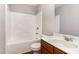 Bright bathroom featuring a shower-tub combination and a modern sink vanity at 1607 Willowcrest Rd, Durham, NC 27703