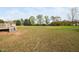 The backyard featuring a deck at 21 W Paige Wynd Dr, Angier, NC 27501