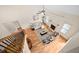 Bright, open living room with hardwood floors, fireplace, and elegant furnishings at 21 W Paige Wynd Dr, Angier, NC 27501