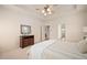 Spacious main bedroom with neutral tones, tray ceiling, and carpet flooring at 21 W Paige Wynd Dr, Angier, NC 27501