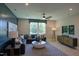 Well-lit living room with modern decor, comfortable seating, and entertainment setup at 2108 New Hope Church Rd, Chapel Hill, NC 27514