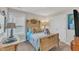 Cozy bedroom featuring a charming bed frame, soft lighting, and a plush teddy bear at 211 Azalea Gaze Dr, Youngsville, NC 27596