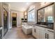 This bathroom features a glass shower, soaking tub, and sinks and a walk-in closet at 215 Bonterra Way, Chapel Hill, NC 27516