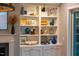 Built-in shelves with decorative vases and objects at 215 Bonterra Way, Chapel Hill, NC 27516