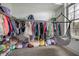 Large walk-in closet with hanging rods, shelves, and a hammock chair at 215 Bonterra Way, Chapel Hill, NC 27516