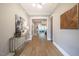 Grand foyer showcasing hardwood flooring, stylish decor, and an open view into the living spaces at 215 Bonterra Way, Chapel Hill, NC 27516
