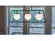 Contemporary black pendant light over a window at 215 Bonterra Way, Chapel Hill, NC 27516