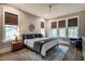 This bedroom features a large window view, neutral color palette and an area rug at 215 Bonterra Way, Chapel Hill, NC 27516