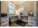 Home office features a built-in desk, natural light, and modern decor at 215 Bonterra Way, Chapel Hill, NC 27516