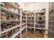 Well-stocked pantry with ample shelving and organized storage for all your kitchen needs at 215 Bonterra Way, Chapel Hill, NC 27516