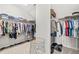 Spacious walk-in closet with organized storage and plenty of room for clothes and accessories at 216 Ocean Jasper Dr, Holly Springs, NC 27540