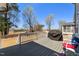 Outdoor deck area with a grill and railing overlooks the backyard at 216 Ocean Jasper Dr, Holly Springs, NC 27540
