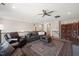 Open-concept living room with stylish furnishings and access to the second floor at 216 Ocean Jasper Dr, Holly Springs, NC 27540