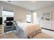 Bright bedroom featuring carpet, two windows and a white dresser with large mirror at 2456 Tonoloway Dr, Raleigh, NC 27610