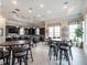 Spacious common kitchen area equipped with modern appliances, seating, and ample counter space at 2456 Tonoloway Dr, Raleigh, NC 27610