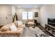 Well-lit living room featuring hardwood floors and comfortable furnishings at 2456 Tonoloway Dr, Raleigh, NC 27610