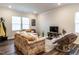 Comfortable living room with natural light, complemented by hardwood flooring at 2456 Tonoloway Dr, Raleigh, NC 27610