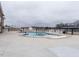 Inviting community pool with clear water, deck chairs, and covered gazebos for relaxation at 2456 Tonoloway Dr, Raleigh, NC 27610
