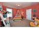 Charming bedroom with a vibrant, playful aesthetic, and natural light at 263 Gilliland Rd, Siler City, NC 27344