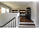 Bright recreation room featuring cozy reading nooks and dark hardwood floors at 263 Gilliland Rd, Siler City, NC 27344