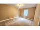 Bedroom with neutral carpet, natural light and a ceiling light at 2704 Pidgeon Hill Rd, Raleigh, NC 27613