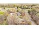 An aerial view of the property highlighting the long driveway and secluded location at 2746 Moss Creek Loop, Elon, NC 27244