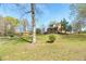 Expansive yard, perfect for recreation and relaxation, surrounds the beautiful home at 2746 Moss Creek Loop, Elon, NC 27244