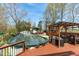 Backyard features a pool with a deck, gazebo, shed, and ample space for recreation at 2746 Moss Creek Loop, Elon, NC 27244