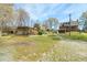 Spacious backyard with a shed, fenced garden, and plenty of room for outdoor activities at 2746 Moss Creek Loop, Elon, NC 27244