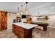 Finished basement featuring a custom-built bar area and a pool table for entertainment at 2746 Moss Creek Loop, Elon, NC 27244