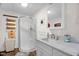 Bright bathroom featuring a glass-enclosed shower and updated vanity at 2746 Moss Creek Loop, Elon, NC 27244