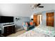 Upstairs bedroom featuring a sitting area and a connected bathroom at 2746 Moss Creek Loop, Elon, NC 27244