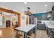 Spacious eat-in kitchen with stainless appliances, island, and a light-colored countertop at 2746 Moss Creek Loop, Elon, NC 27244