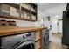 Laundry room with new washer and dryer and storage solutions at 2746 Moss Creek Loop, Elon, NC 27244
