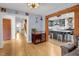 Open-concept living area featuring hardwood floors and seamless transition to the updated kitchen at 2746 Moss Creek Loop, Elon, NC 27244