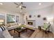 Cozy living room with a fireplace, comfortable seating, and contemporary decorations at 285 Gilliland Rd, Siler City, NC 27344