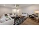 Spacious living room featuring sleek furnishings, and a stylish black and white geometric rug at 285 Gilliland Rd, Siler City, NC 27344