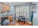 Bright home gym with a sink, large window, and plenty of space for workout equipment and accessories at 2922 Bells Pointe Ct, Apex, NC 27539