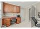 Office featuring wood cabinetry, and a desk with drawers and a tile backsplash at 2922 Bells Pointe Ct, Apex, NC 27539