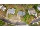 Desirable home with mature trees, complemented by a well-kept lawn and an inviting driveway at 301 Tillamook Dr, Wake Forest, NC 27587