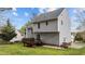 Charming home featuring a wooden deck, gray siding, and a lush green backyard, perfect for outdoor enjoyment at 301 Tillamook Dr, Wake Forest, NC 27587