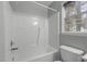 Clean and bright shower-tub combo with modern fixtures and ample space for a comfortable bathing experience at 301 Tillamook Dr, Wake Forest, NC 27587