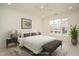 Bright bedroom with a large window, soft carpet, and neutral décor at 3700 Baron Cooper Pass # 104, Raleigh, NC 27612