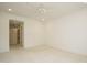 Spacious bedroom features neutral walls and carpet, crown molding, and ceiling fan at 3700 Baron Cooper Pass # 104, Raleigh, NC 27612