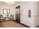 Residential elevator lobby with chairs, table, and carpet at 3700 Baron Cooper Pass # 104, Raleigh, NC 27612