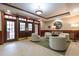 Building lobby with seating area, stylish decor, and access to building amenities at 3700 Baron Cooper Pass # 104, Raleigh, NC 27612