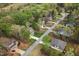 Aerial view of a neighborhood with tree-lined streets and well-maintained homes at 3729 Norman Blalock Rd, Willow Springs, NC 27592