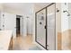 Spacious bathroom with a tile floor offers a glass shower and access to the walk-in closet at 3729 Norman Blalock Rd, Willow Springs, NC 27592