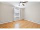 Bright bedroom with hardwood floors and a window at 3729 Norman Blalock Rd, Willow Springs, NC 27592
